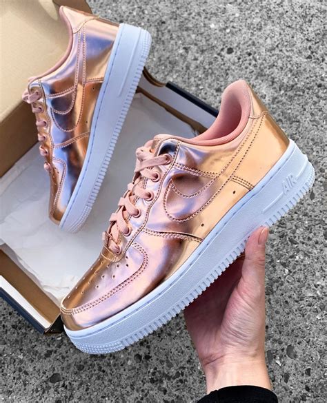 Nike metallic rose gold shoes